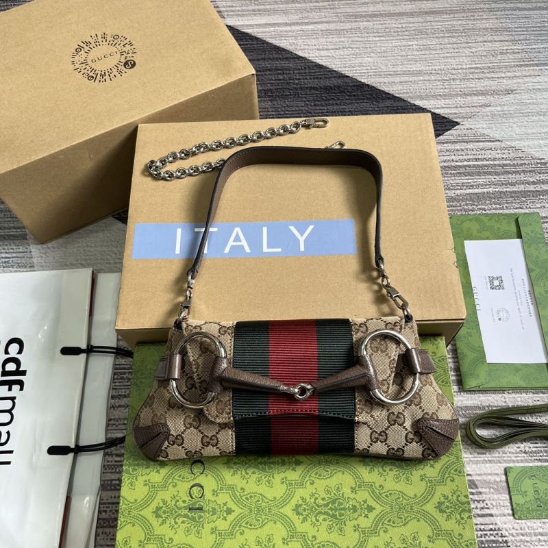 G*u*i horsebit bags